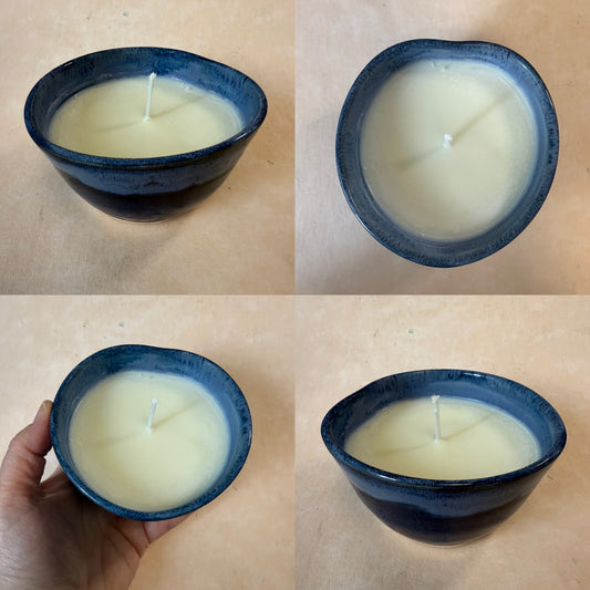 Candle in hand thrown pottery